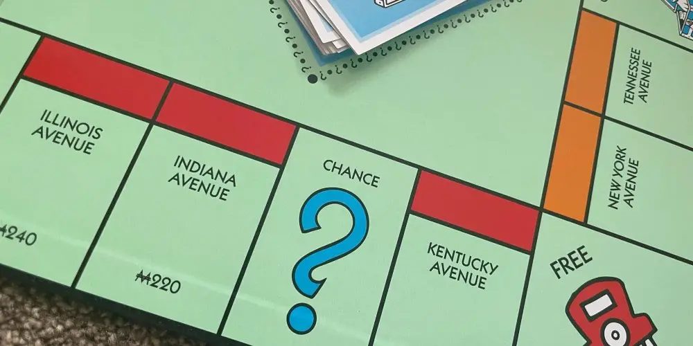 Monopoly squares showing Illinois Avenue, Indiana Avenue, Kentucky Avenue, and chance.