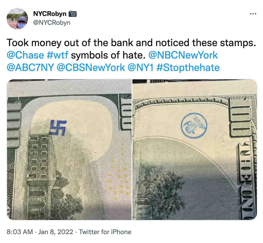 A tweet with her cash having a swastika stamp.