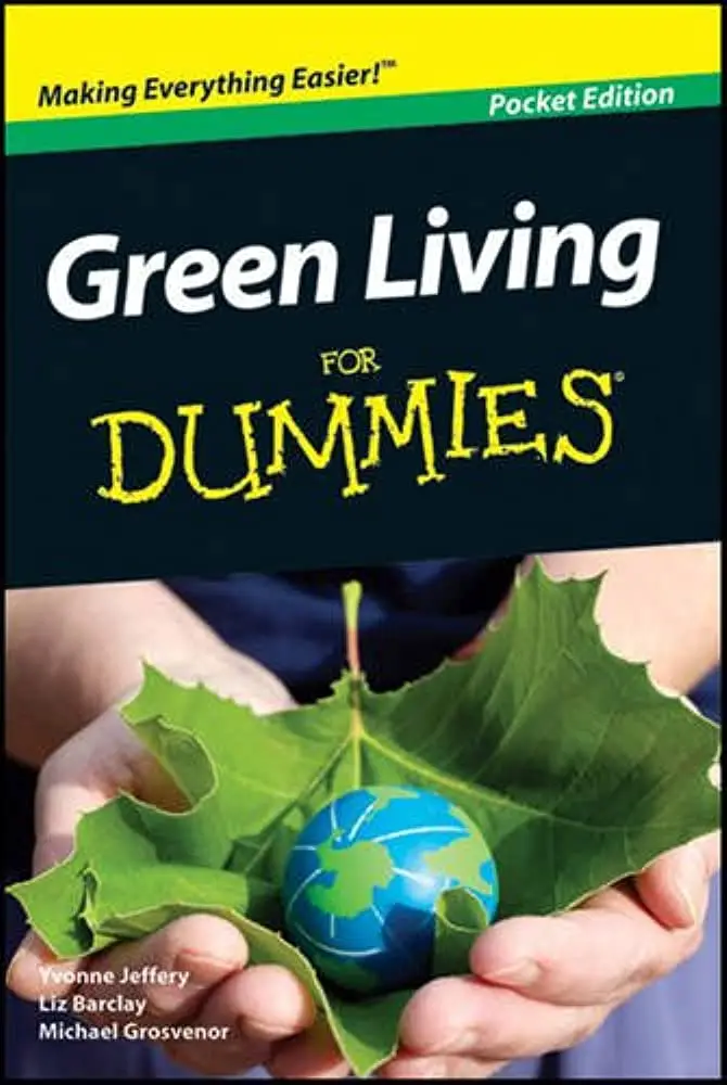 Book cover of Green Living for Dummies which shows a replica of the earth held on a leaf with two hands.