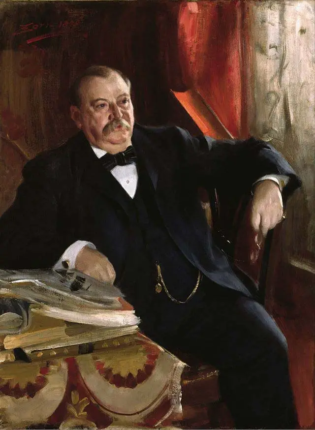 President Cleveland sitting with his beer belly while leaning on the table with books.