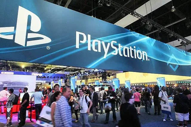 Lots of people in a Sony PlayStation booth Exterior in Chicago, USA.