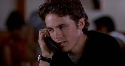 Casey Affleck also known as Kevin's brother taking a phone call.