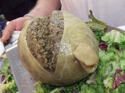 Haggis food served on a plate with salads.