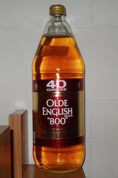 A bottle of Olde English malt liquor 40 Oz still full and unopened.