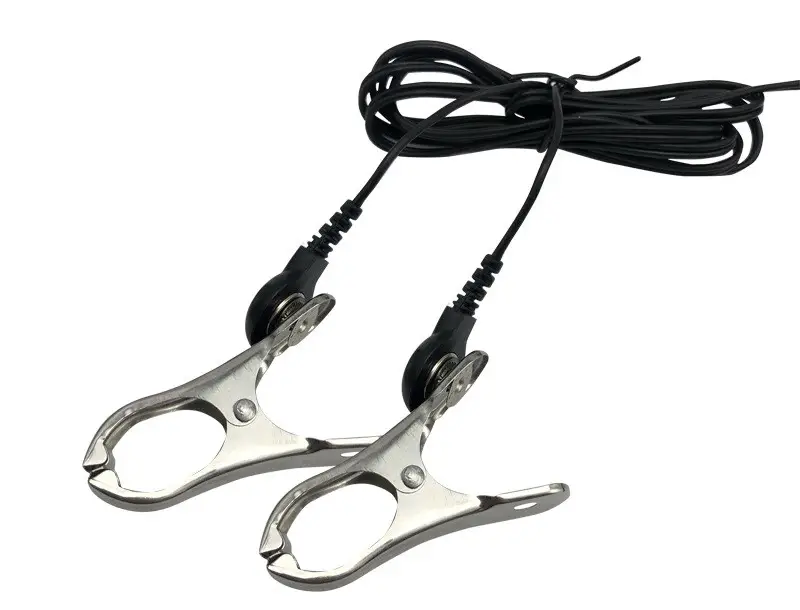 Two electric nipple clamps with black cords.