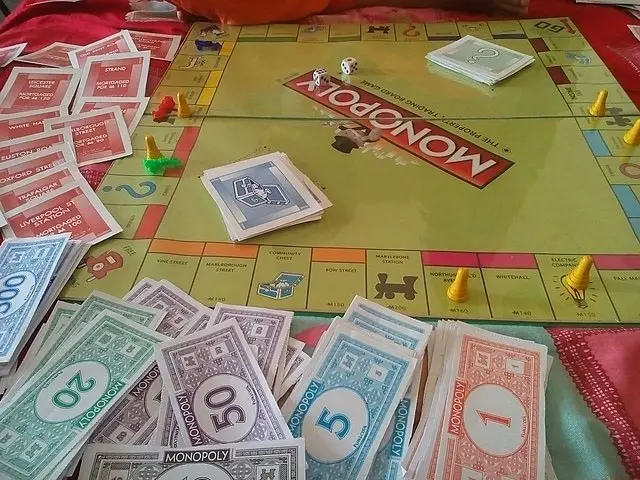Cash lying around the monopoly board.