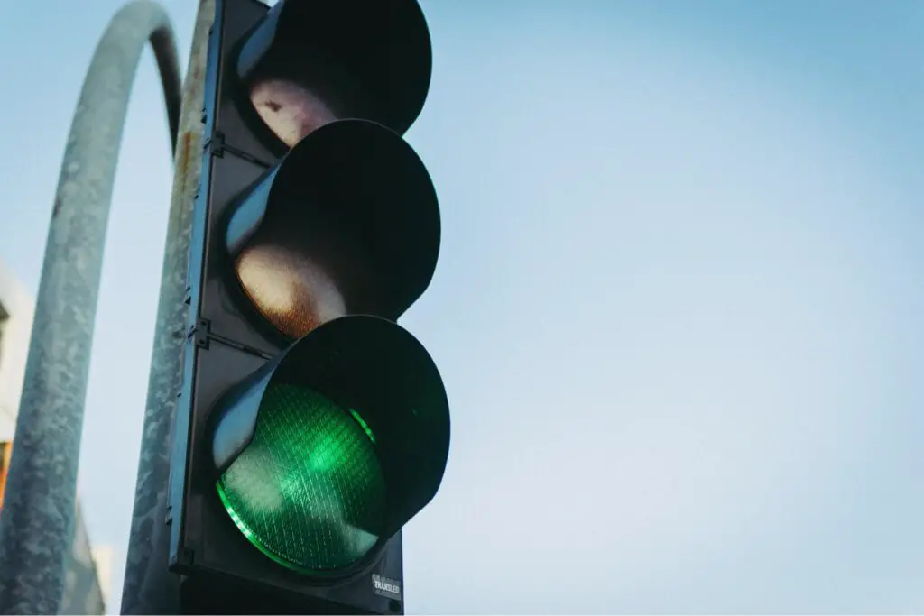 A stop light showing the go "green light".