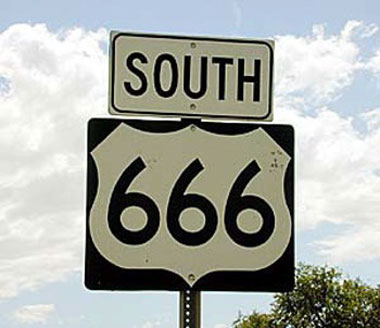 South 66 road sign in black and white color.