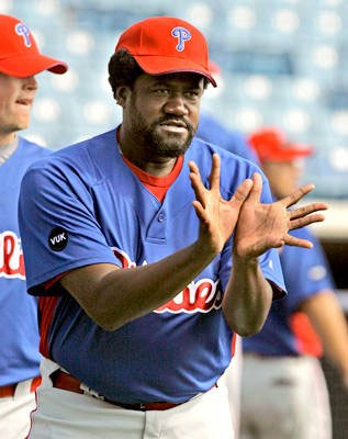 Relief pitcher Antonio Alfonseca showing his extra 11 fingers.