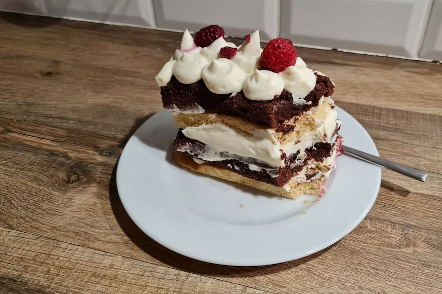 A slice of cake whipped with mascarpone cream.