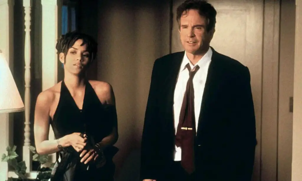 Warren Beatty wearing a gentlemen's suit with actress Halle Berry in the movie Bullworth.