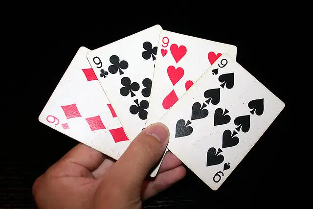 Your lucky numbers for this card game is the nine of clubs, diamonds, hearts, and spades.