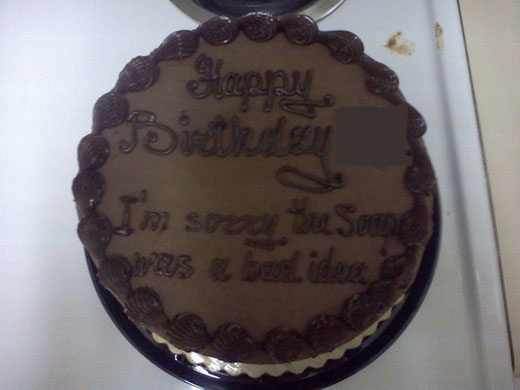 A chocolate-flavored happy birthday cake and sorry cake at the same time.