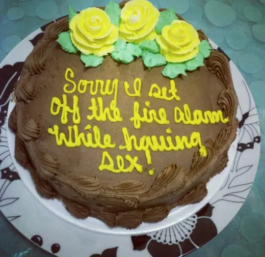 Probably one of the most unusual and unexpected sorry cakes with the message, "Sorry I set off the fire alarm while having sex!"