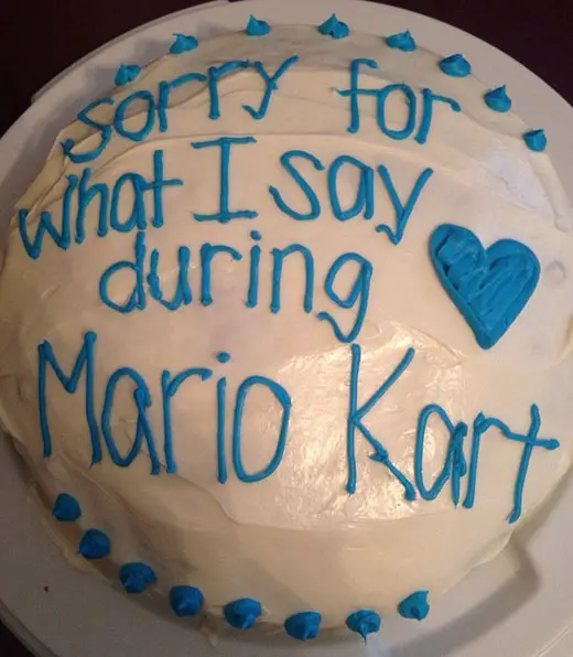 An apology cake with a message, "Sorry for what I say during Mario Kart"