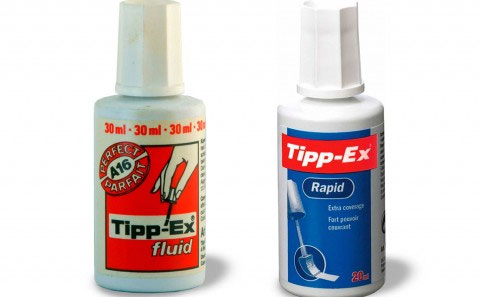 Two bottles of tippex or correction fluid.