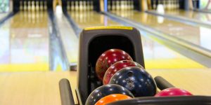 Bowling balls ready for use in a game.