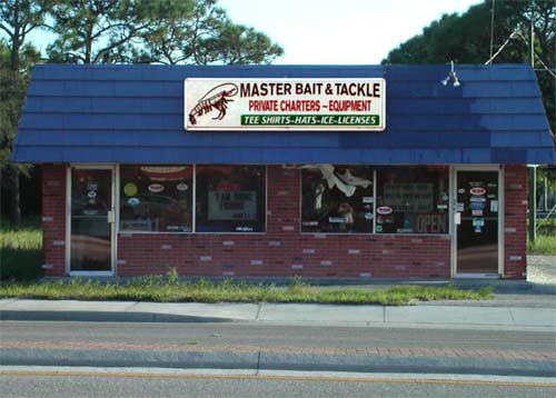 A funny business name called, "The Master Bait and Tackle" built on the roadside.