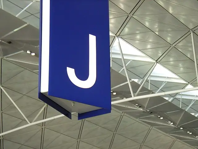 Letter J hanging in an airport terminal.
