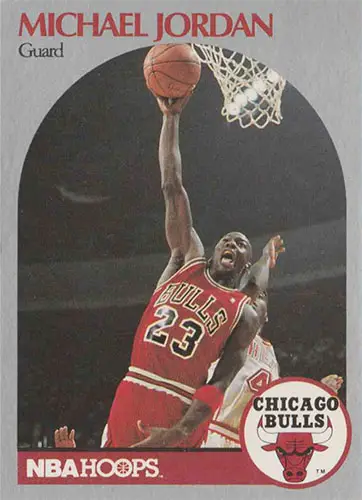 Michael Jordan making a dunk in this NBA basketball card.