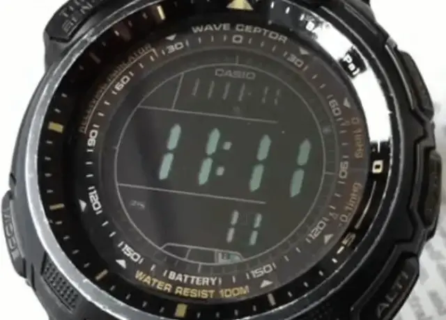 A wristwatch showing the time and date as 11/11.